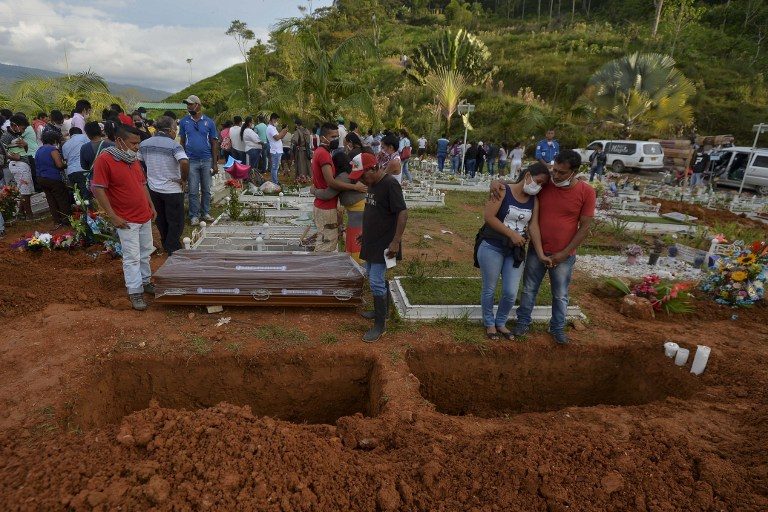 Wails of grief as Colombia town lays mudslide victims to rest