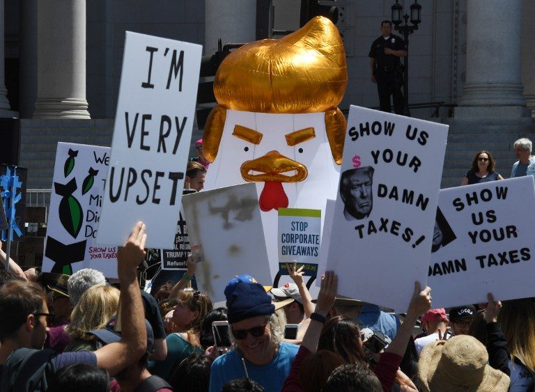 Protesters across U.S. press Trump to release tax returns