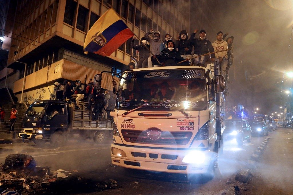 Clashes at protests in Ecuador over fuel price hike, oil facilities seized