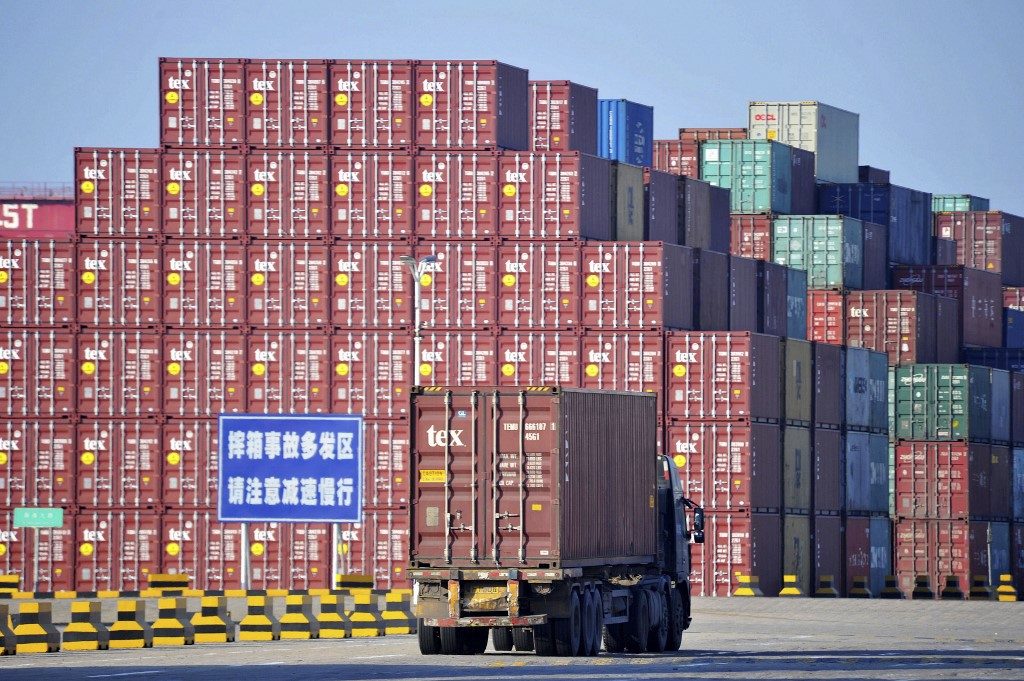 China imports plunge, exports fall on virus hit to global growth