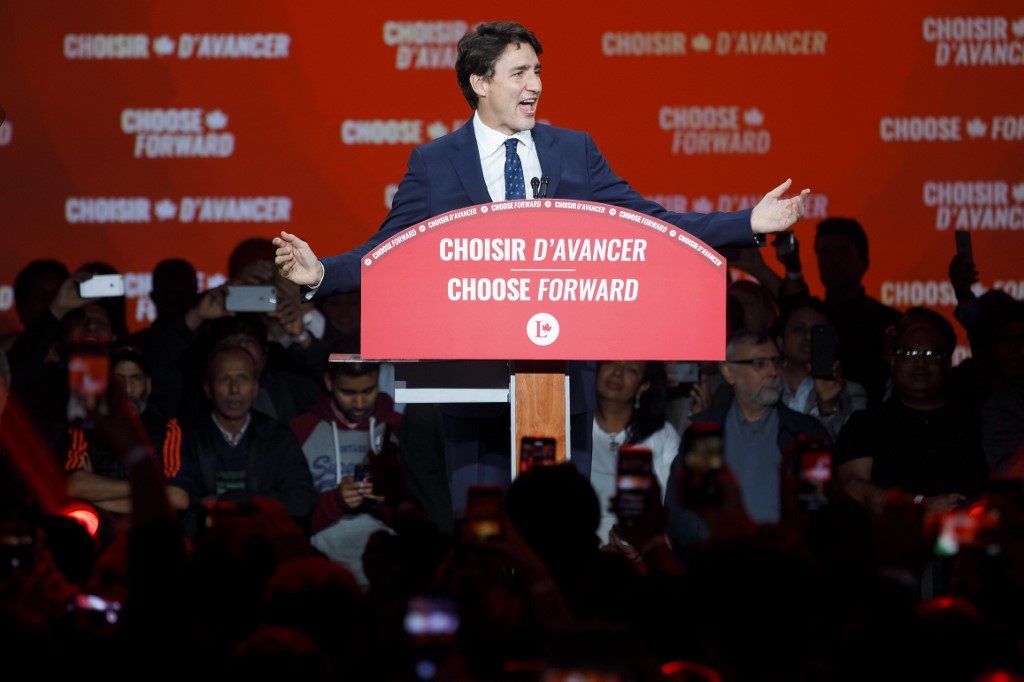 Victorious but weakened, Trudeau needs help to form government