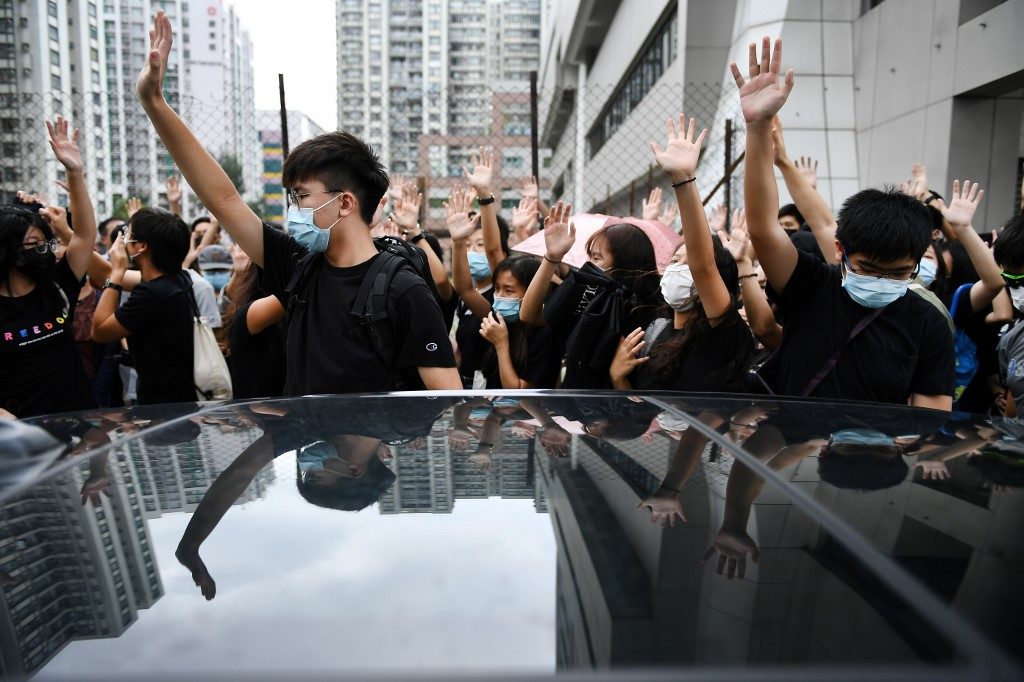 First Hong Kongers appear in court for defying mask ban