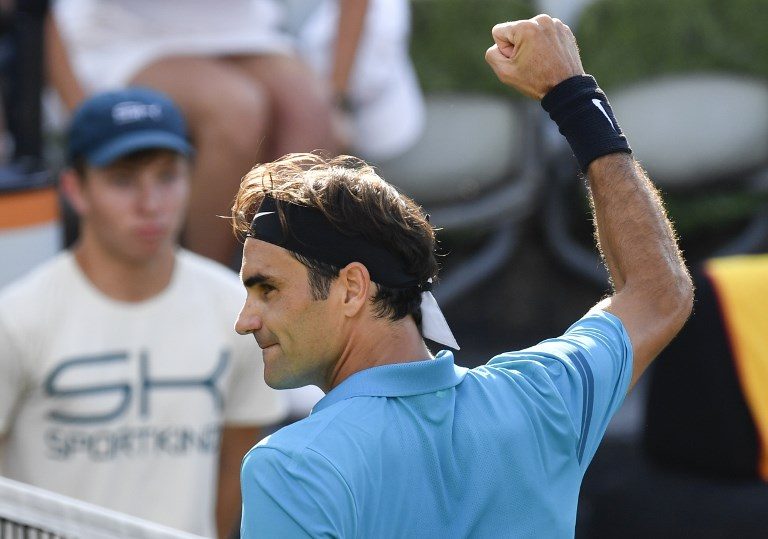 Federer reclaims world number one title