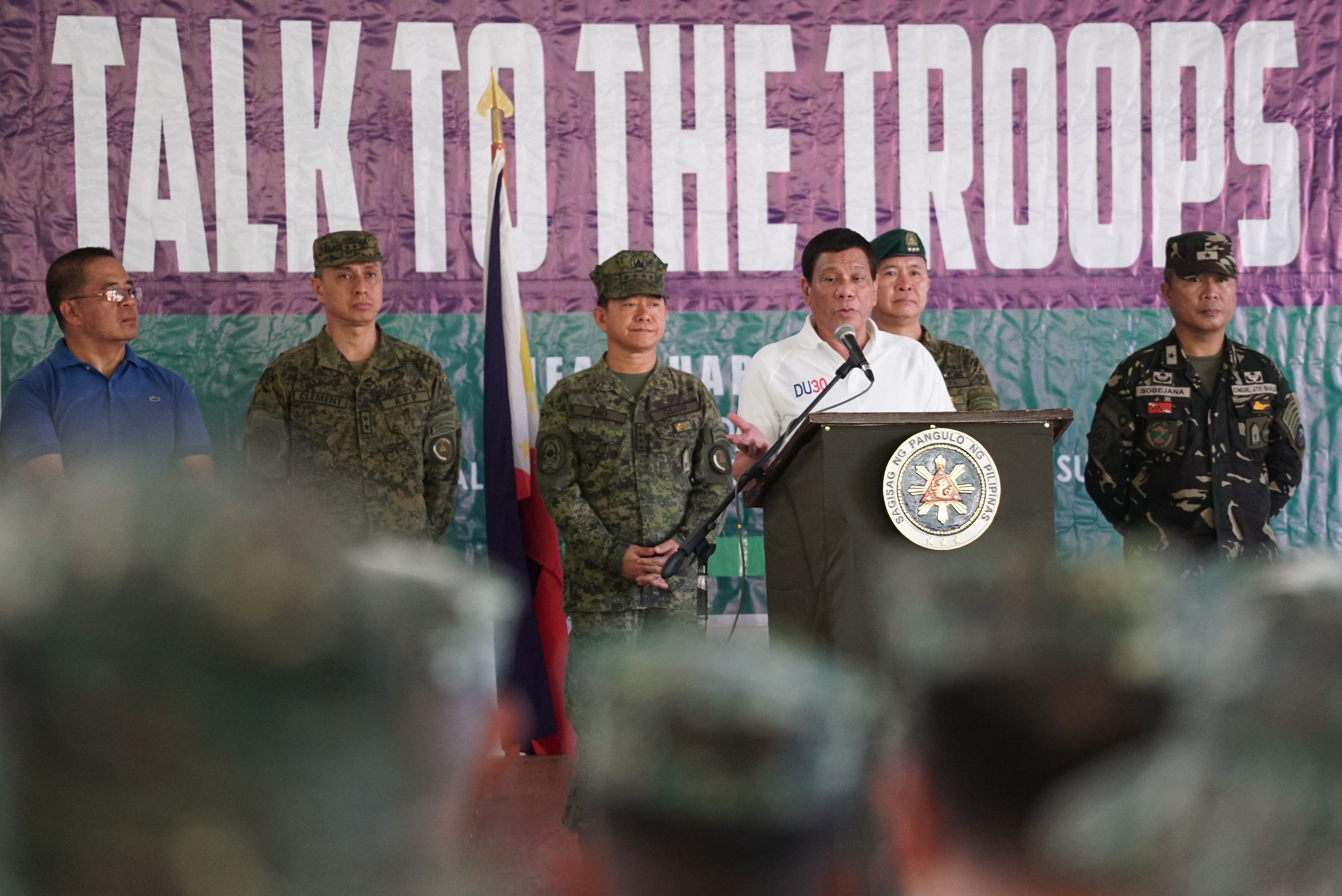 TROOPS IN SULU. President Rodrigo Duterte tells Joint Task Force Sulu of his offer to Muslim separatists and communist rebels to join the military. Malacañang photo 