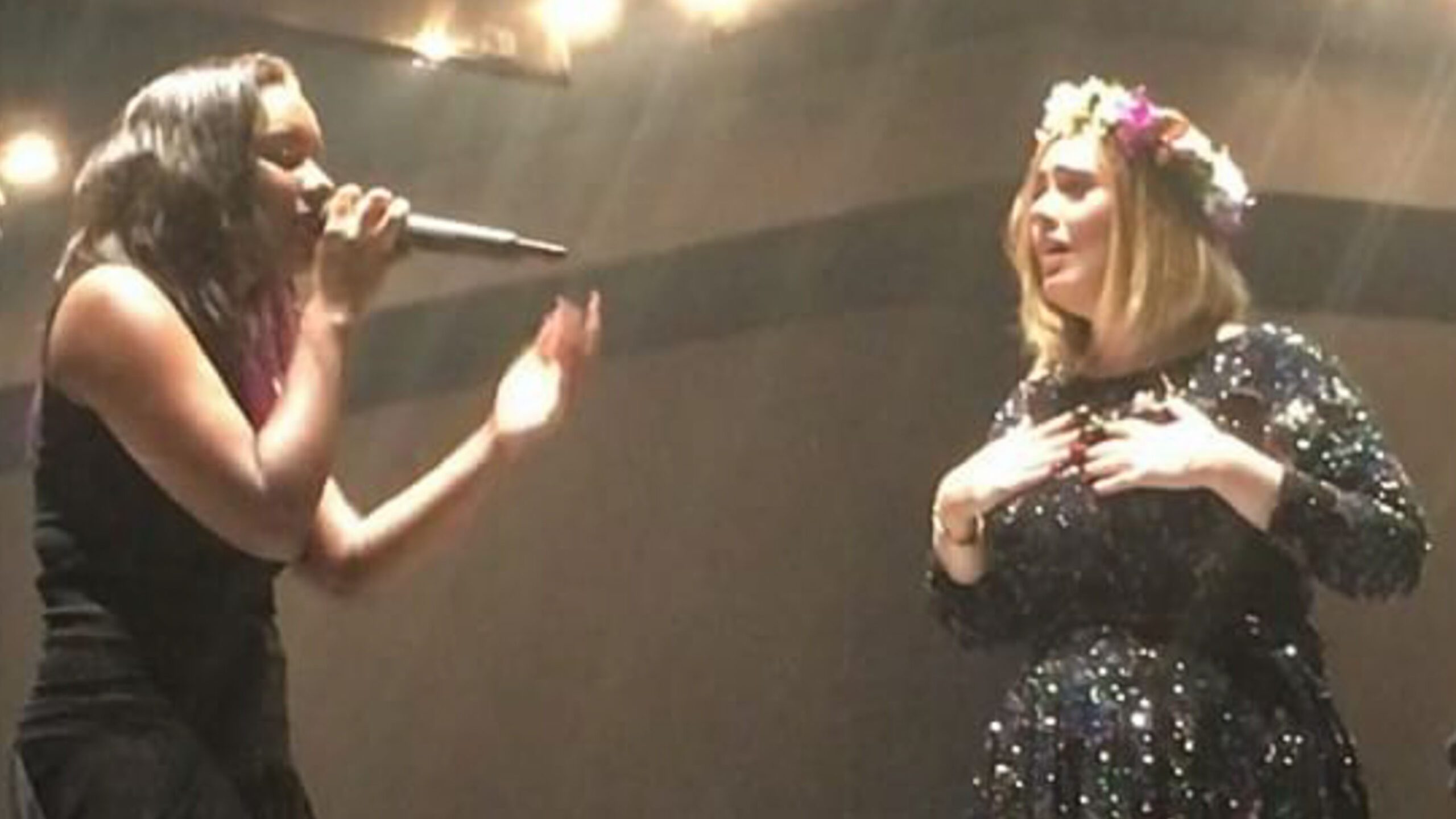WATCH: Adele sings with Grammy-nominated fan at concert