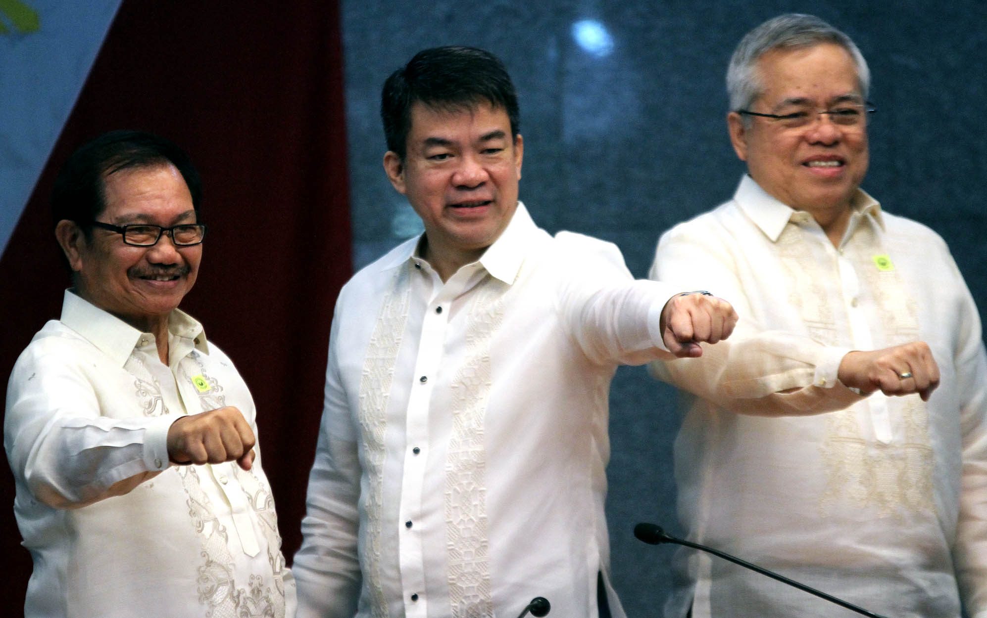 CONFIRMED: Commission on Appointment (CA) Chair and Senate President Aquilino âKokoâ Pimentel III gives a closed-fist sign with Agriculture Secretary Emmanuel F. PiÃ±ol (left) and Trade Secretary Ramon M. Lopez (right) after the ad-interim appointments of the two secretaries were confirmed in plenary, Wednesday, February 1, 2017. PRIB Photo by Cesar Tomambo  