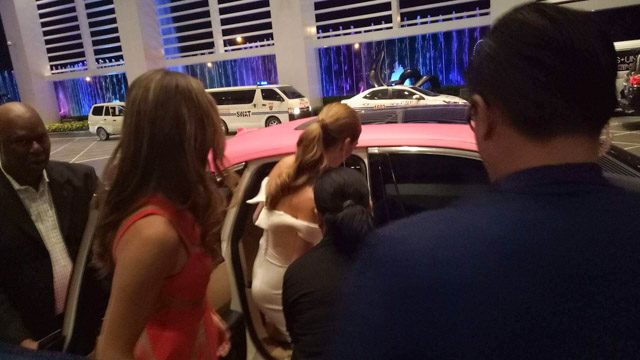 Miss Universe 2016 Iris Mittenaere and Miss Universe 2017 Demi-Leigh Nel-Peters is escorted back to the car after the welcome dinner 