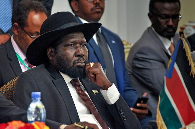 South Sudan president signs peace deal despite doubts