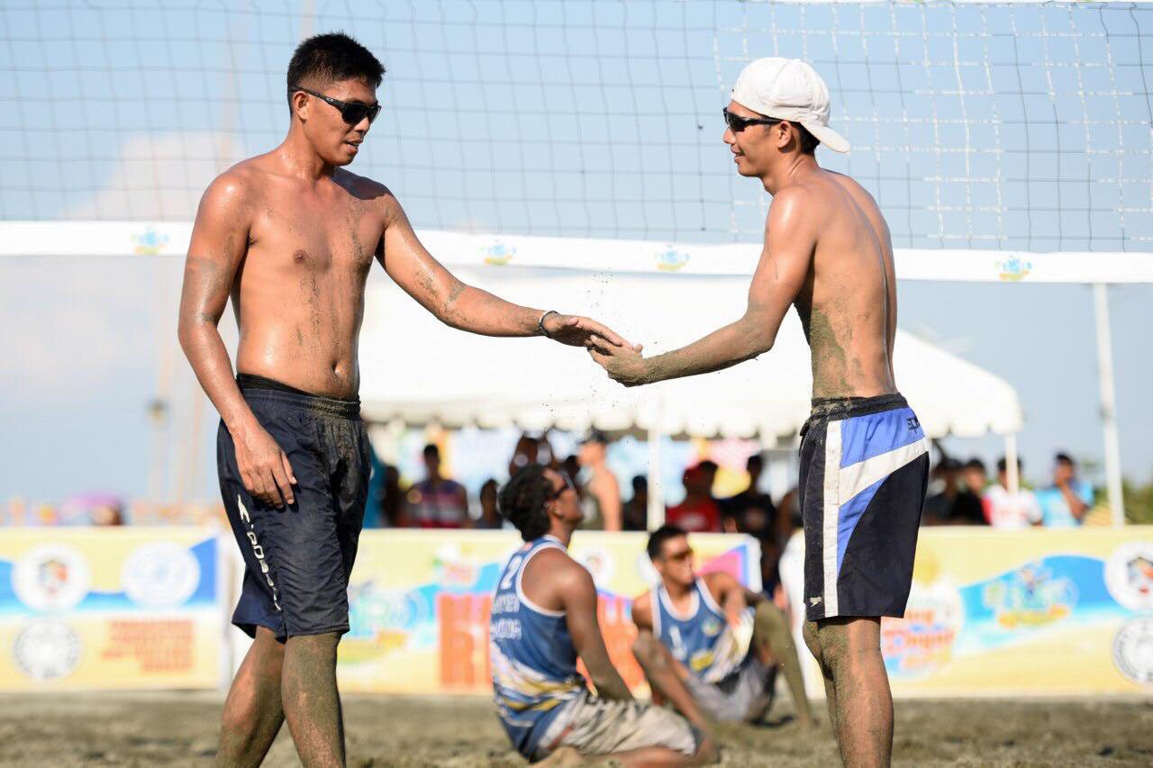 SOLID DUO. Air Force's Mike Abria celebrates a point with Jade Becaldo during the championship round. Photo from BVR 