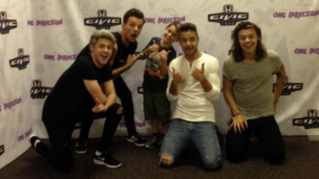 Little boy teaches One Direction how to nae nae