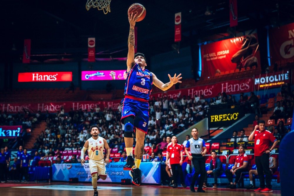 BREAKTHROUGH. Kent Salado goes for an easy layup to help Arellano secure its first triumph. Photo by Kyle Janremy Bustos/Rappler  