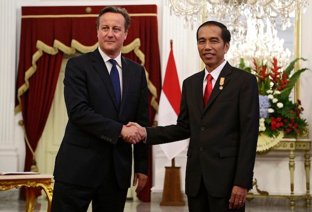 British PM visits Southeast Asia with trade, ISIS on agenda