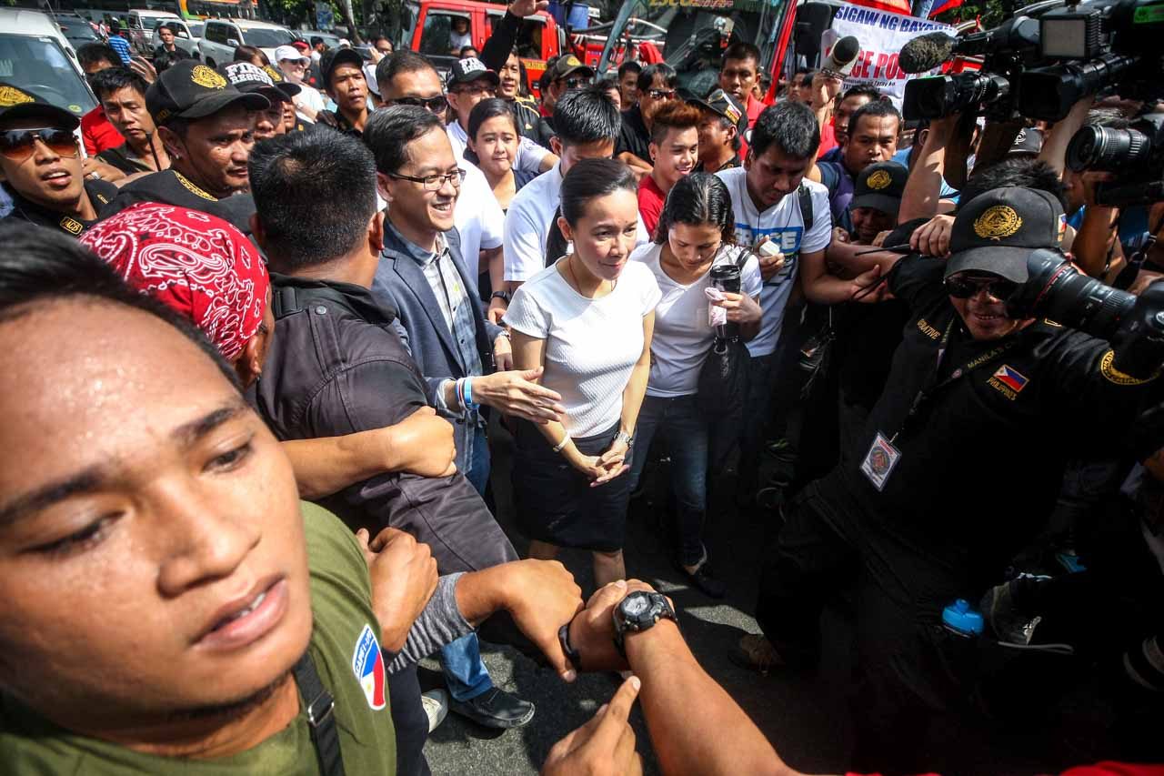 STAPLE. One of the staple faces in Poe's campaign is Gary Jimenez, political officer. Here he is seen beside Senator Grace Poe (L). Photo by Ben Nabong/Rappler  