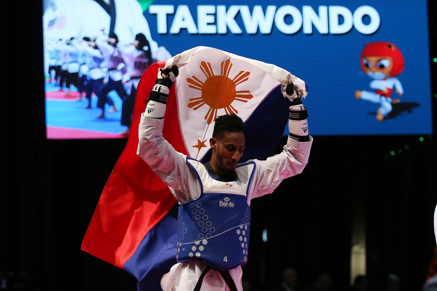WINNER. Samuel Thomas Harper Morrison of the Philippines battles Ardian Prayogo Dinggo of Indonesia in the finals of the men's -74kg taekwondo competition. Morrisson prevailed to win the gold medal. Photo from PSC-POC Media 