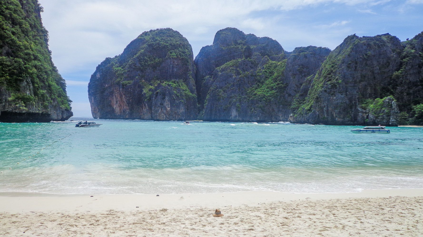 Maya Bay. The fine, bone white sand and clear waters are alluring despite the huge crowd 