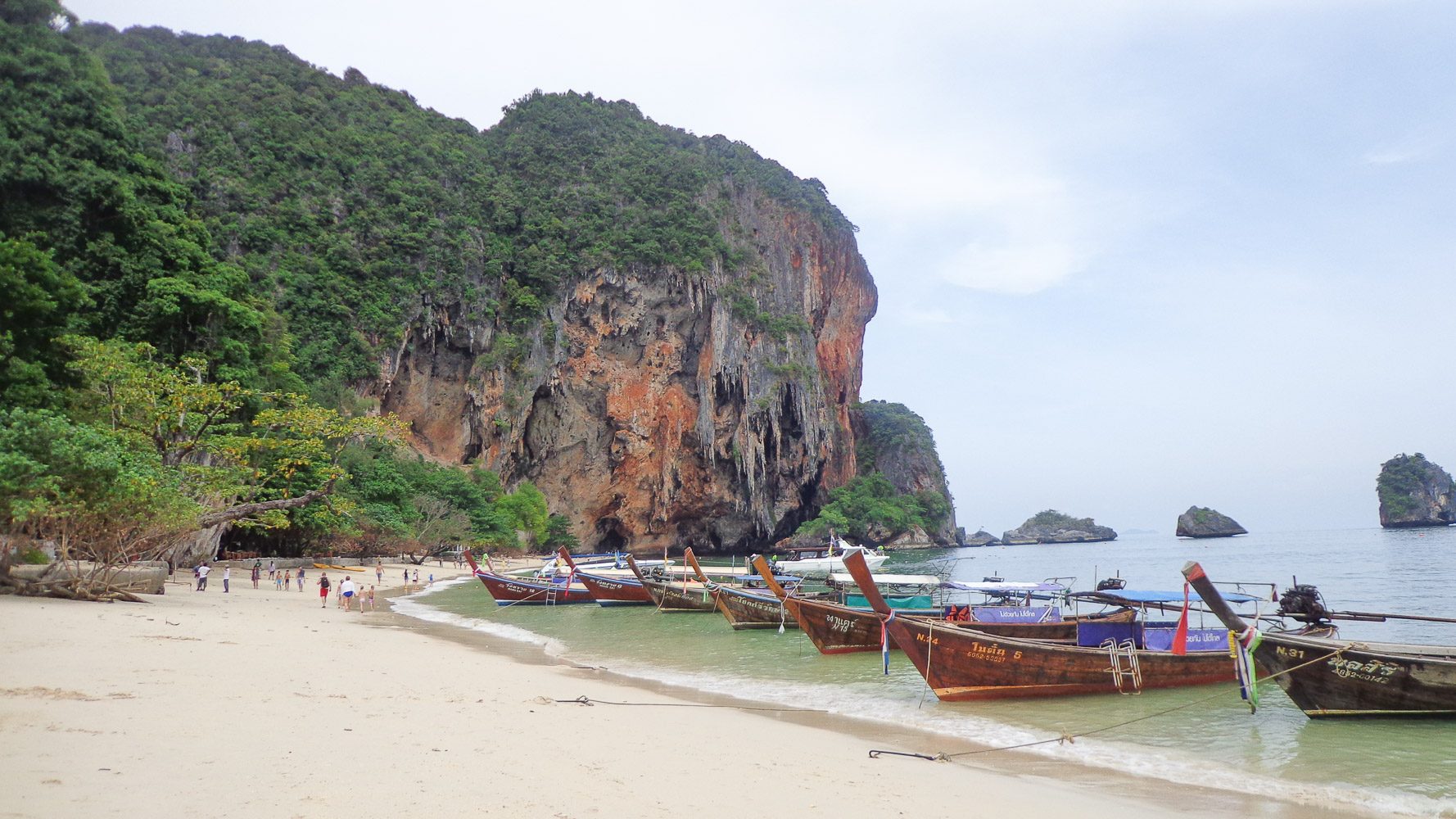 Railay Beach. Despite the crowds Railay maintains its natural charm. Swim in the waters and marvel at nature's wonder. 