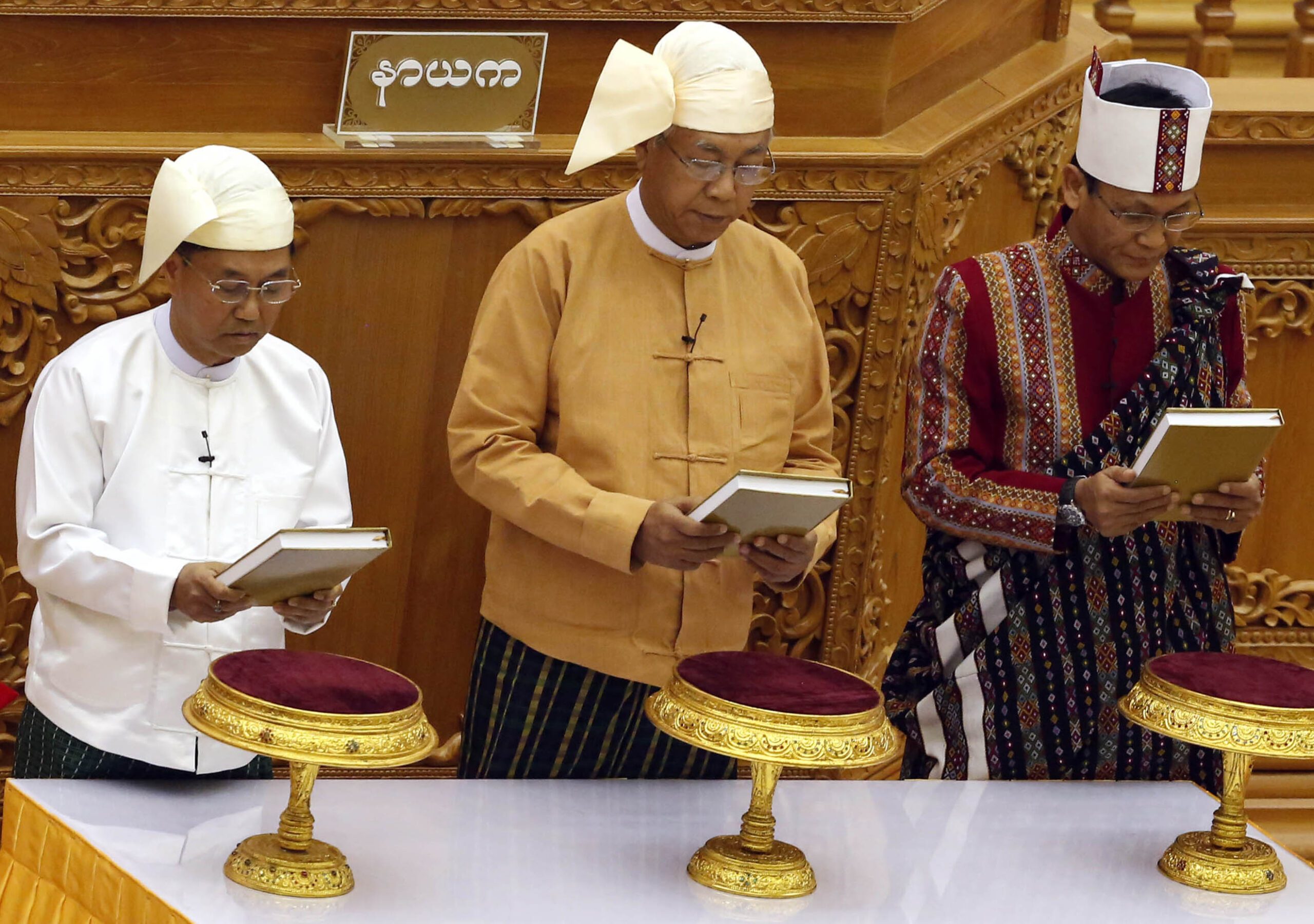 In historic power shift, Myanmar swears in civilian president