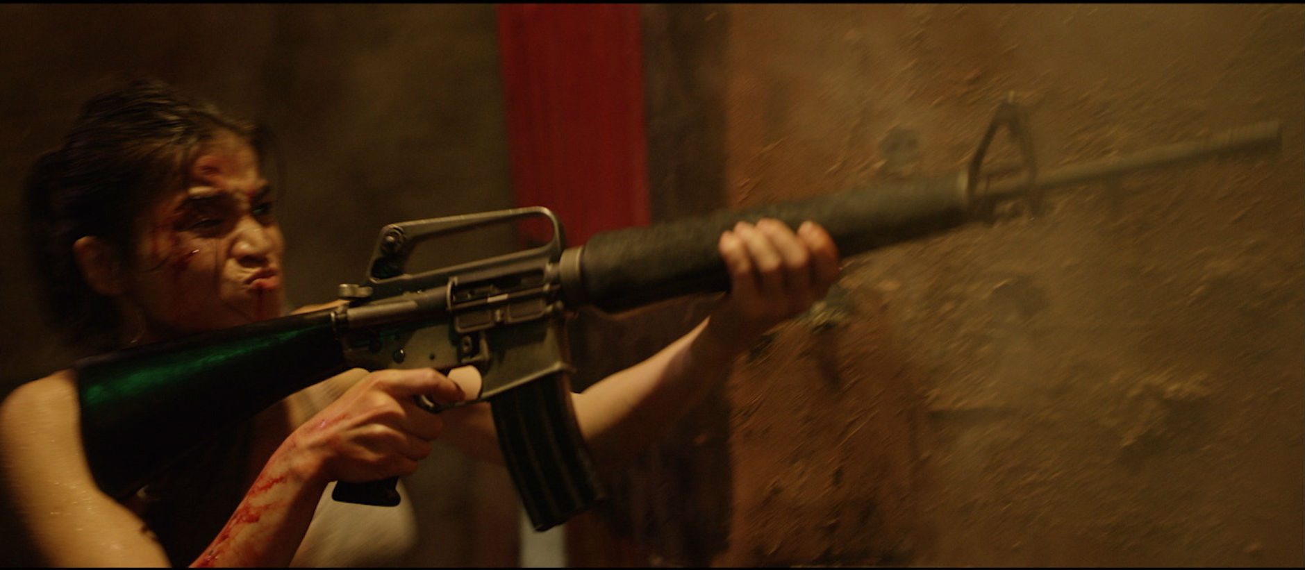 ACTION LADY. Anne Curtis in a scene from Erik Matti's 'Buy Bust.' Photo from Viva Ent 