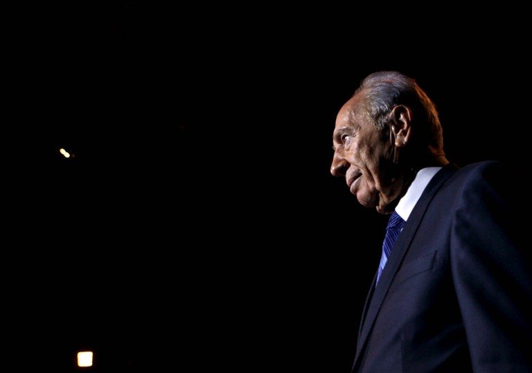 Israeli President Shimon Peres gets off the stage after delivering a speech during the 'Facing Tomorrow' Conference. This is the second annual global conference hosted by Peres on October 20, 2009 in Jerusalem. AFP PHOTO/GALI TIBBON/POOL / AFP PHOTO / GALI TIBBON 