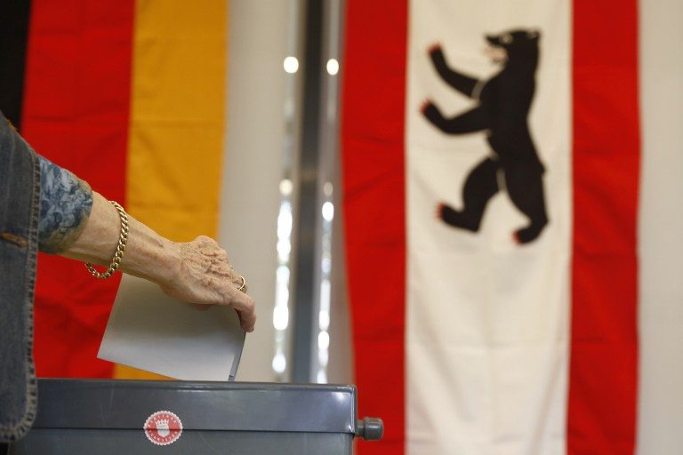 Merkel party routed in Berlin polls as right-wing AfD gains
