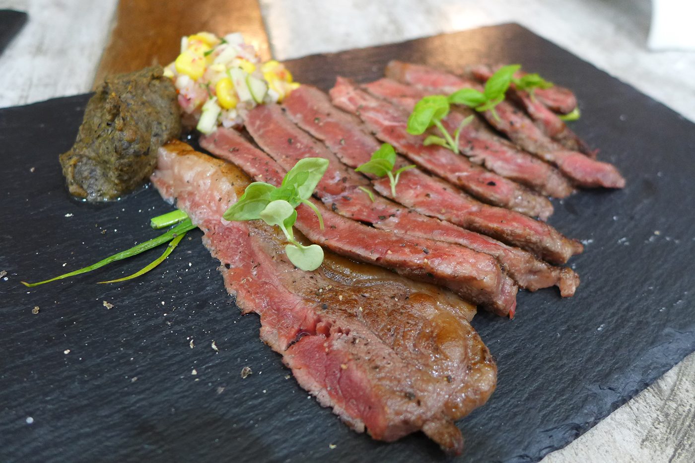 CATCH IT WHILE YOU CAN. Lightly seared strips of premium wagyu beef served with miso eggplant puree.
 