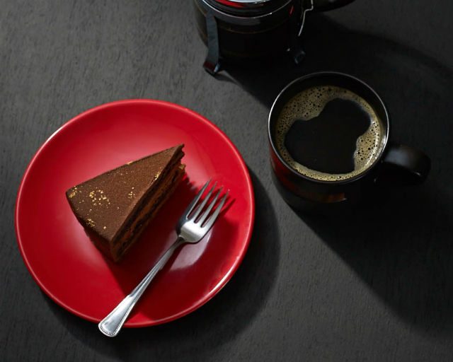 DARK BELGIAN CHOCOLATE CAKE. This rich cake has a light dusting of gold to bring in some holiday cheer. Photo courtesy of Starbucks Philippines 