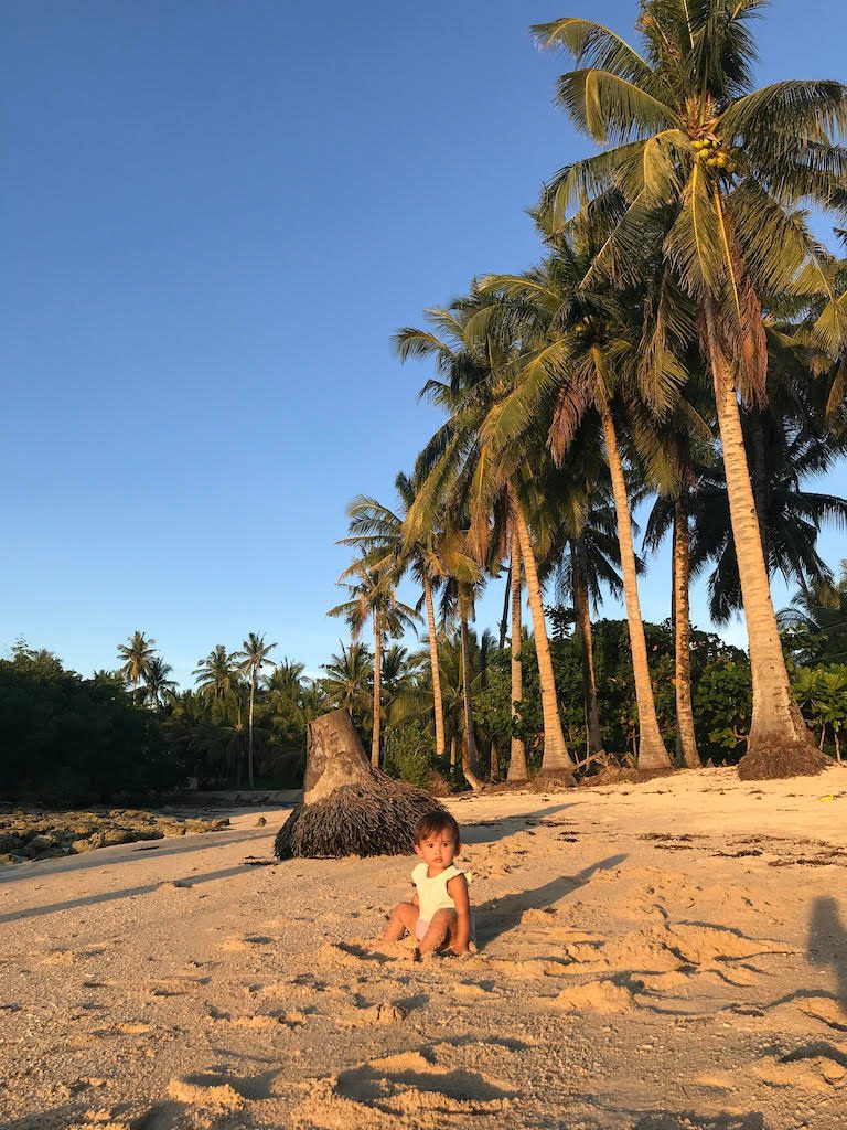 BEACH BABY. Tala enjoys the sand on an empty Siargao beach. Photo courtesy of Elaine Abonal Bayer 