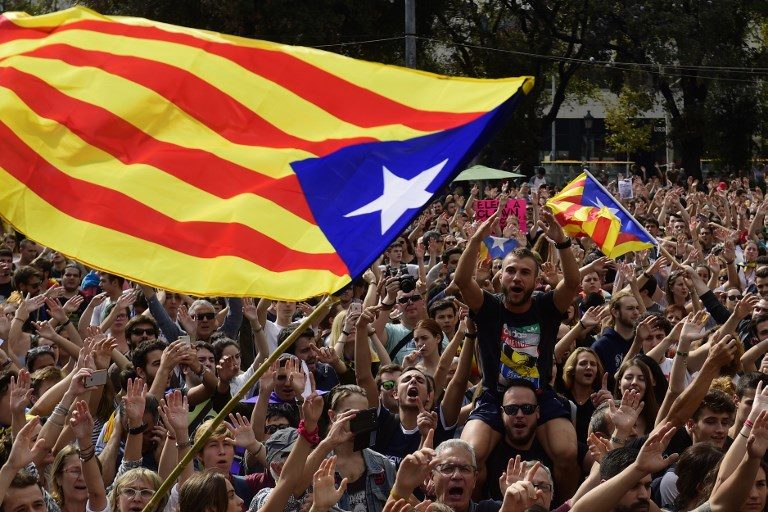 Catalan separatists weigh options after Spain raises the stakes