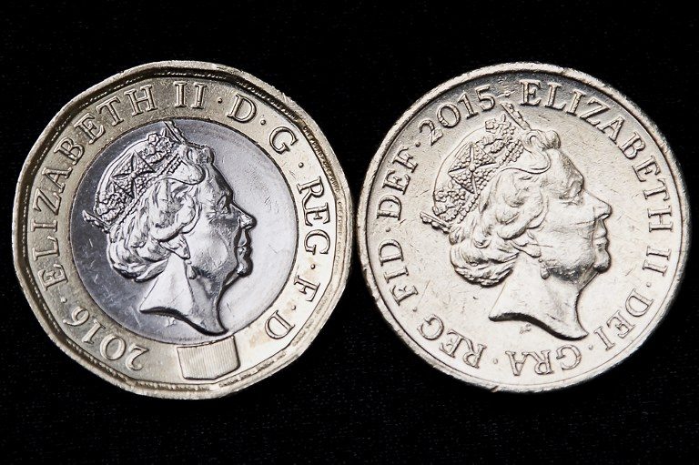 Defiance in Britain over new £1 coin as deadline looms