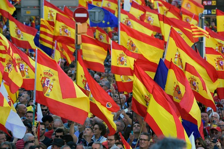 Spain PM Rajoy calls on companies not to leave Catalonia