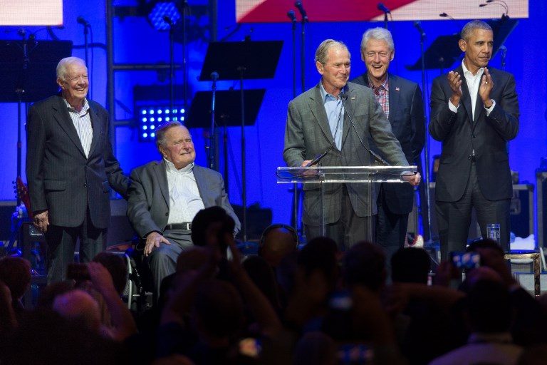 Former U.S. presidents take stage at hurricane benefit concert