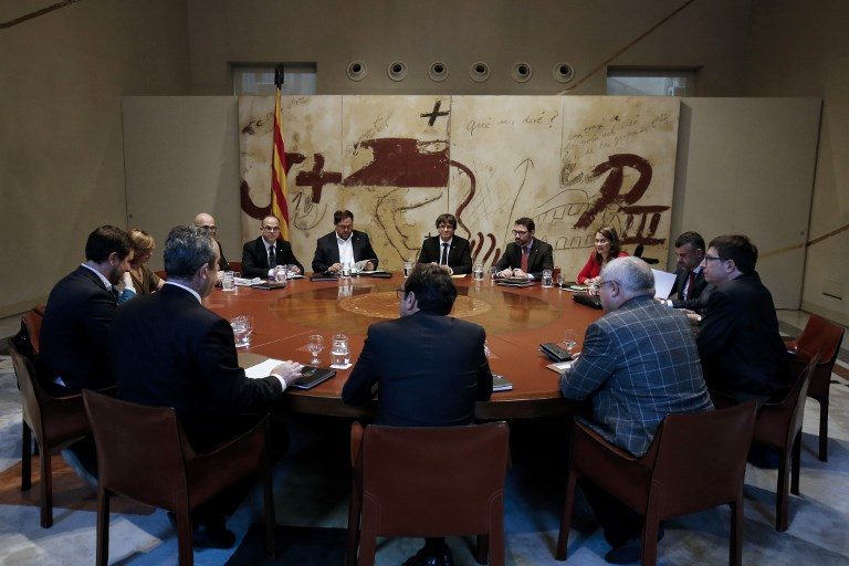 Catalan leaders sign independence declaration but put it on hold