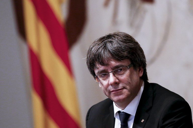 Sacked Catalan leader turns himself in to Belgian police