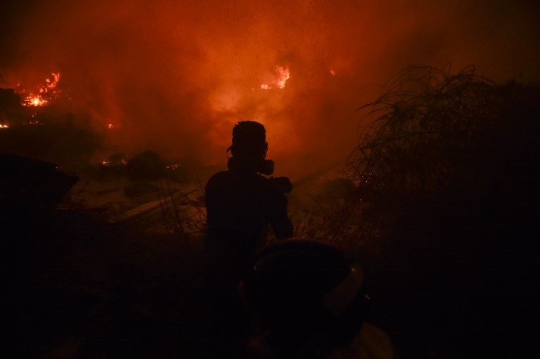 30 killed as wildfires rage in Portugal and Spain