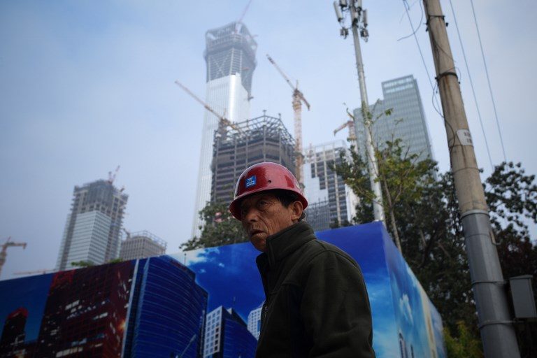 China’s economic growth slows in Q3 but on course to beat target