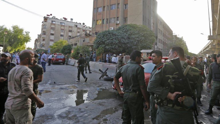 At least 16 dead as suicide bombings hit Damascus police station