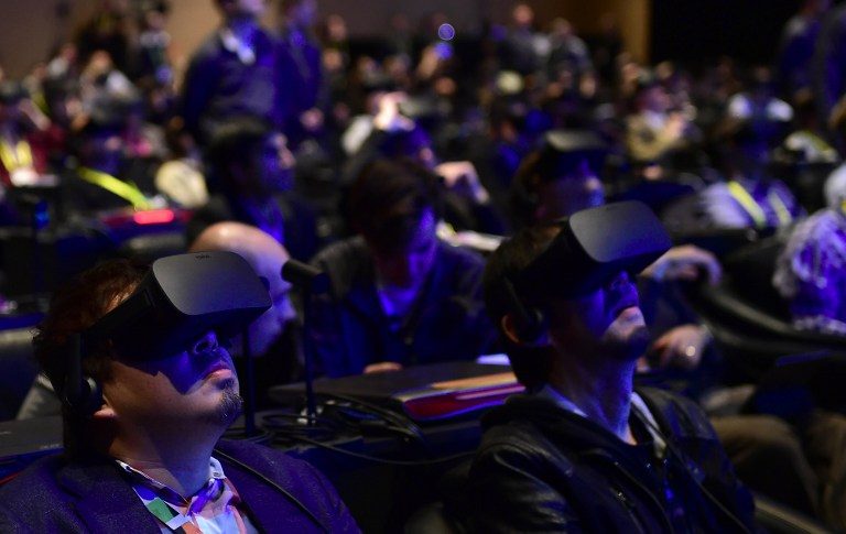 VR REVOLUTION. Attendees wear goggles to sample Virtual Reality during the Intel press conference at the 2017 Consumer Electronics Show in Las Vegas, Nevada, on January 4, 2017. Photo by Frederic J. Brown/AFP 