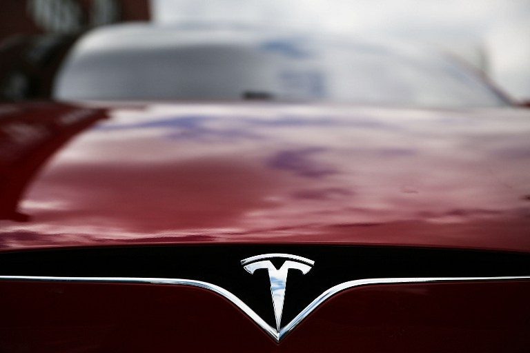 Tesla to build self-driving tech into all cars