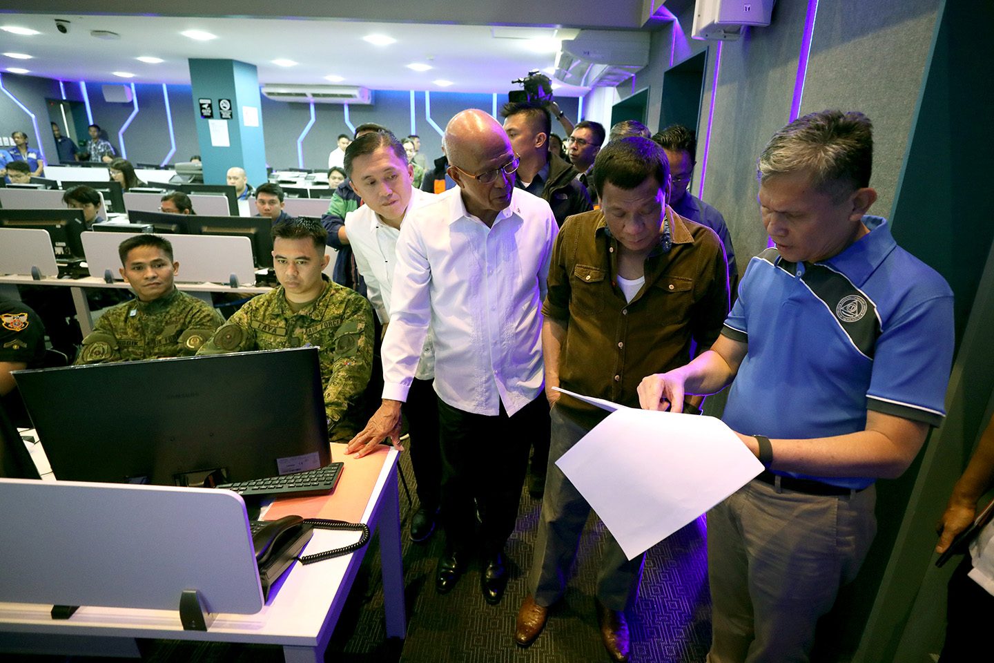 President Rodrigo Roa Duterte listens to the disaster preparedeness briefing of National Disaster Risk Reduction and Management Council (NDRRMC) Executive Director Ricardo Jalad inside the Operations Room of the NDRRMC Building in Camp Aguinaldo, Quezon City on September 13, 2018 as the country braces for the onslaught of Typhoon 'Ompong.' Joining the President are Secretary Christopher Lawrence 'Bong' Go of the Office of the Special Assistant to the President and Defense Secretary Delfin Lorenzana. ROBINSON NIÃAL JR./PRESIDENTIAL PHOTO
 