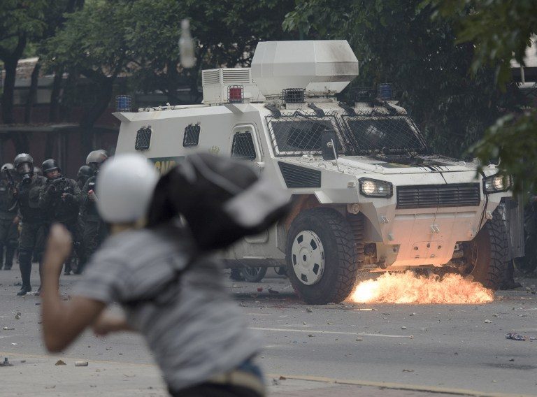 Flames, fatality at Venezuela demo over leader’s crisis maneuver