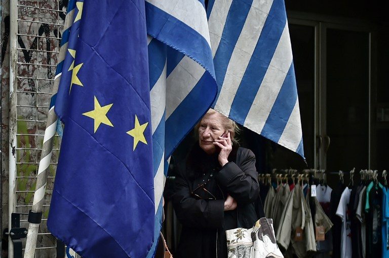 Greece, creditors look to debt relief after provisional fiscal deal