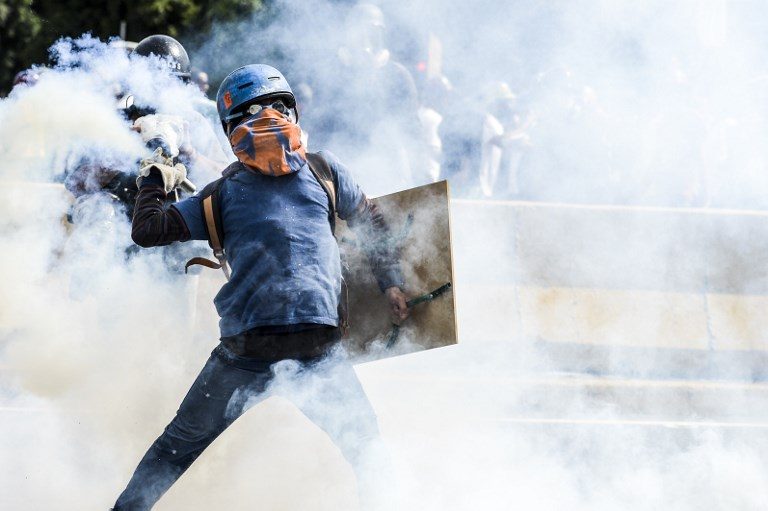 Clashes as Venezuela opposition turns up heat on government