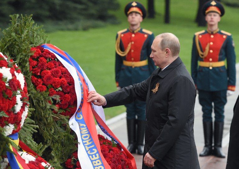 Putin urges world to fight terror as Russia marks WWII victory