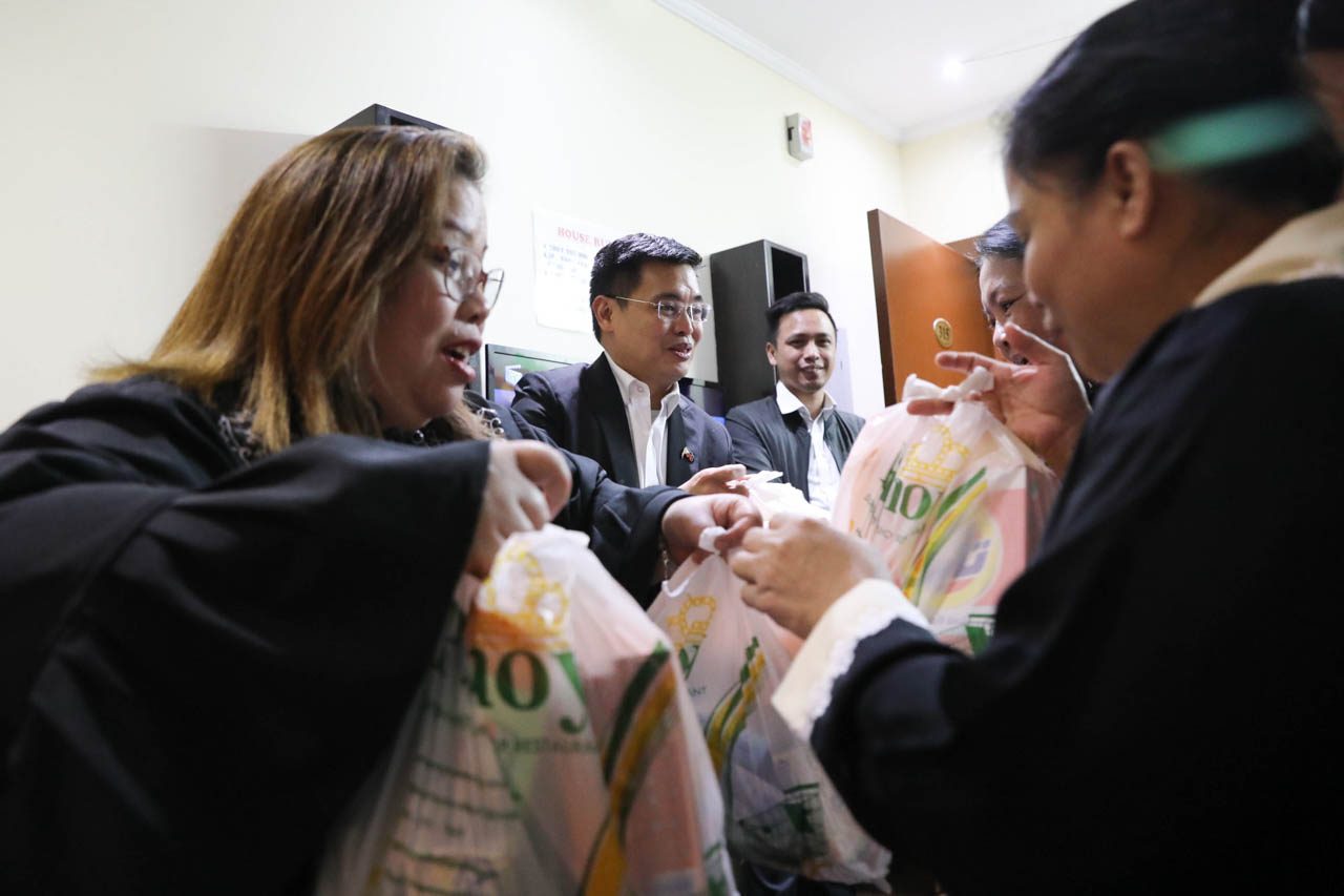 ASSISTANCE. OFWs receive Christmas care packages and financial assistance during the holidays. 