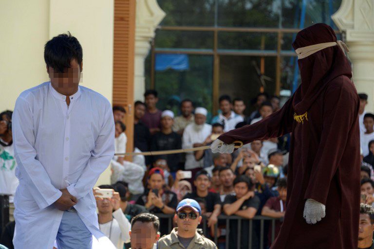 Indonesia’s Aceh whips gay couple for sharia-banned sex