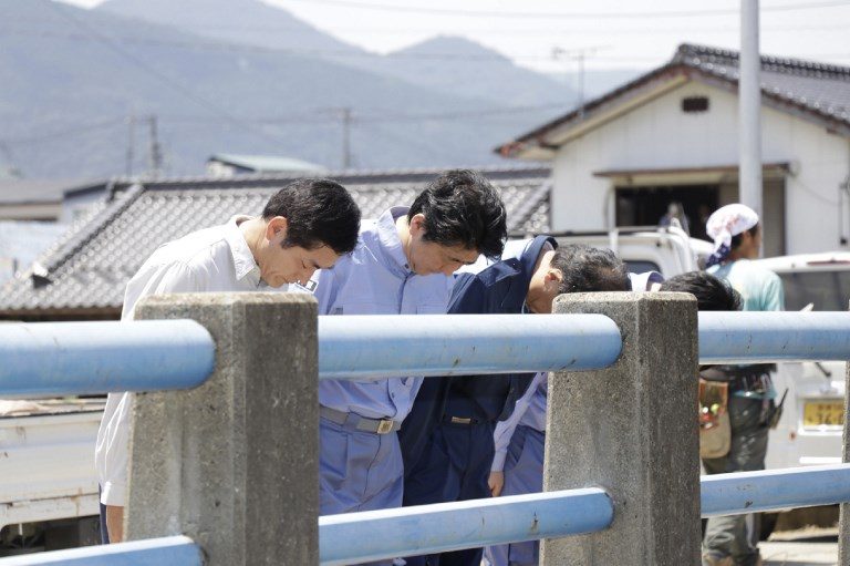 Japan PM meets rain disaster survivors, pledges more aid