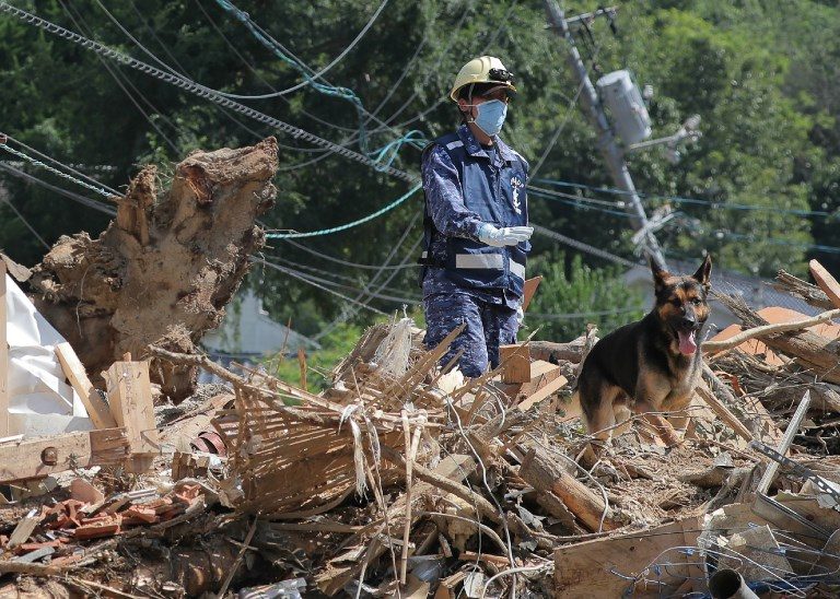 Japan tackles clean-up as rains toll nears 200