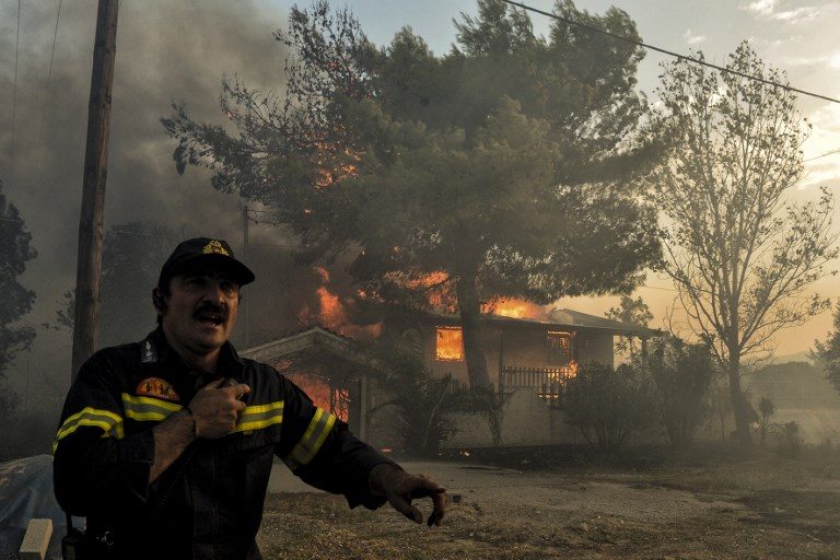Greece in mourning as horrifying wildfires kill 74