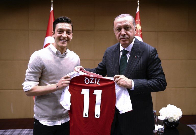 CONTROVERSIAL. German footballer of Turkish origin Mesut Ozil (left) poses for a photo with Turkish President Recep Tayyip Erdogan in London. Photo by Kayhan Ozer/AFP 