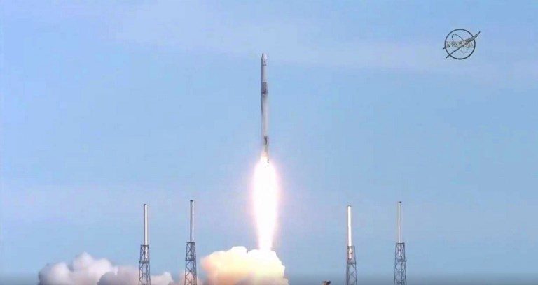 SpaceX launches cargo to space station using recycled rocket, spaceship